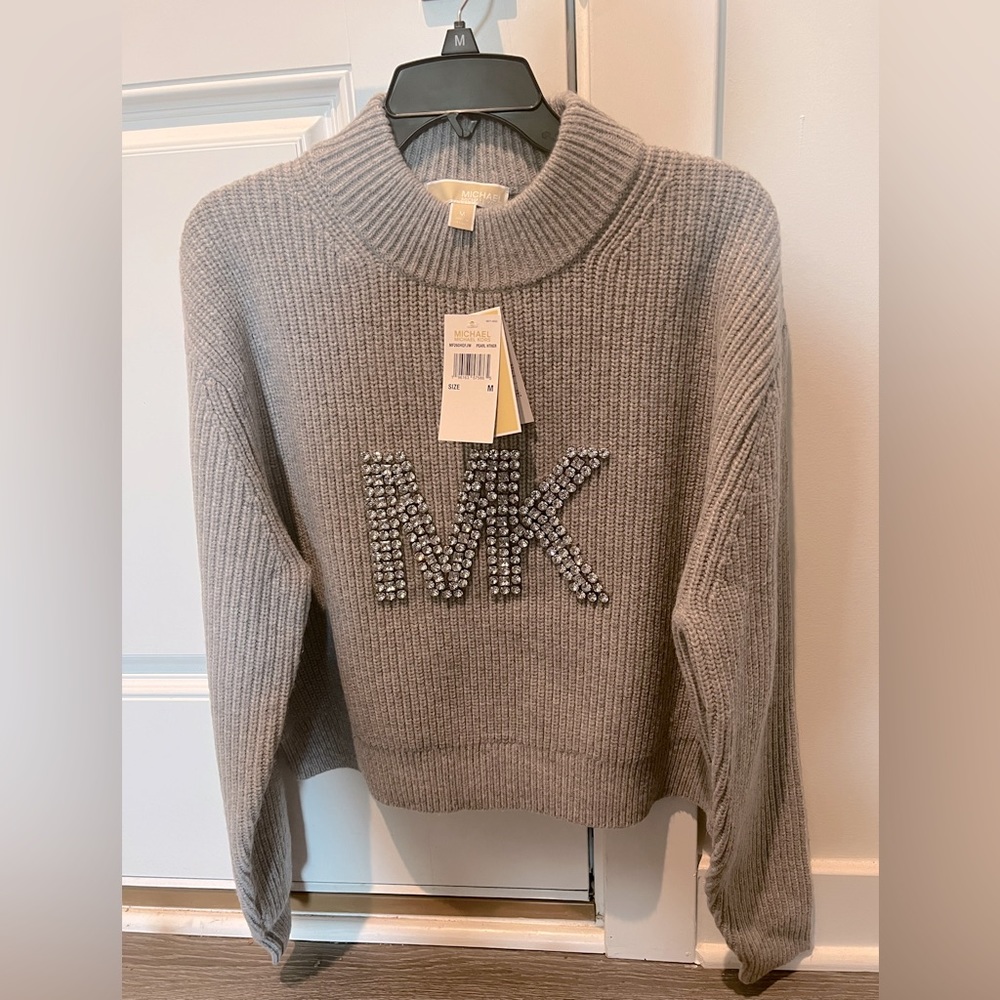 MK embellished logo wool blend sweater.